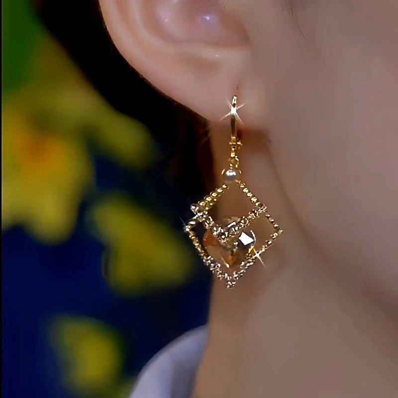 Close-up detail of the sparkling zircons and plating on the Brown Crystal Earrings