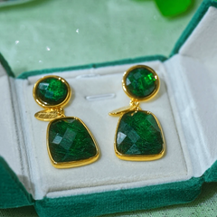Angled view of the 14K Gold-Plated Luxury Green Crystal Tassel Earrings