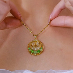 Detailed view of the 14K Gold-Plated Luxury Green Diamond Cat's Eye Stone Mesh Hoop Necklace chain and pendant