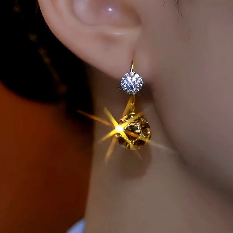 Close-up detail of the sparkling zircons and plating on the Coffee Color Earrings