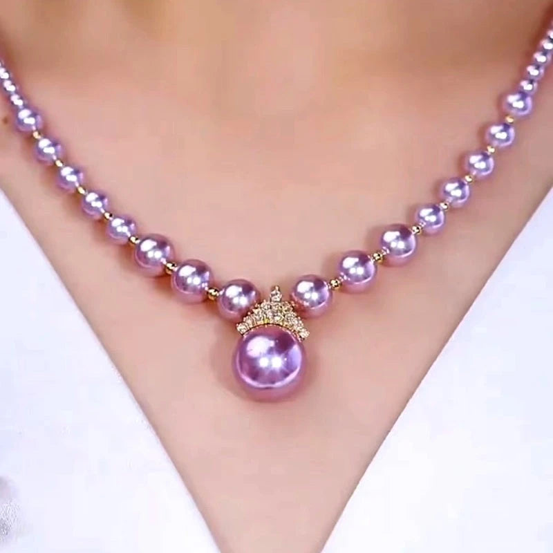 Close-up of the pendant and clasp on the Purple Pearl Necklaces