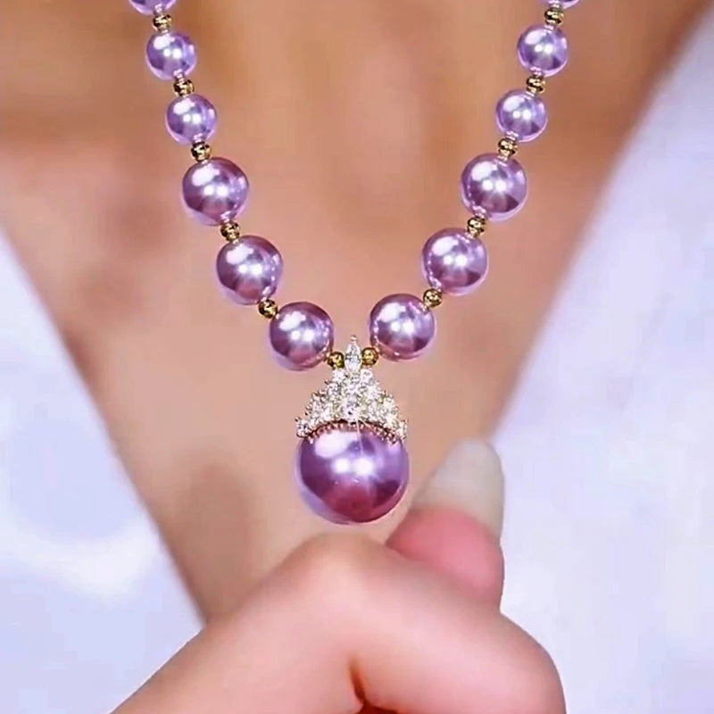 Detailed view of the 14K Gold-Plated Luxury Manta Rose Purple Pearl Necklaces chain and pendant