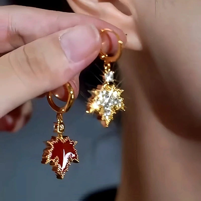Close-up detail of the sparkling zircons and plating on the Maple Leaf Earrings