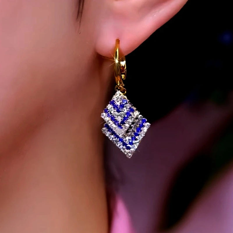 Close-up detail of the sparkling zircons and plating on the Tassel Earrings