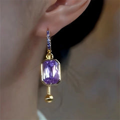 Close-up detail of the sparkling zircons and plating on the Purple Diamond Tassel