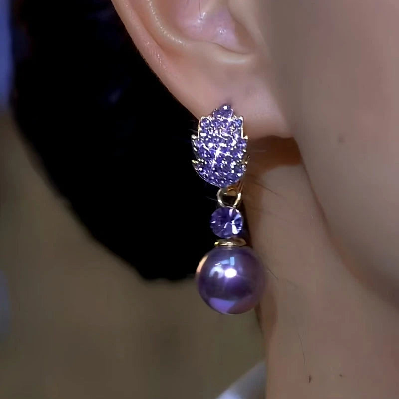 Close-up detail of the sparkling zircons and plating on the Leaf Pearl Earrings
