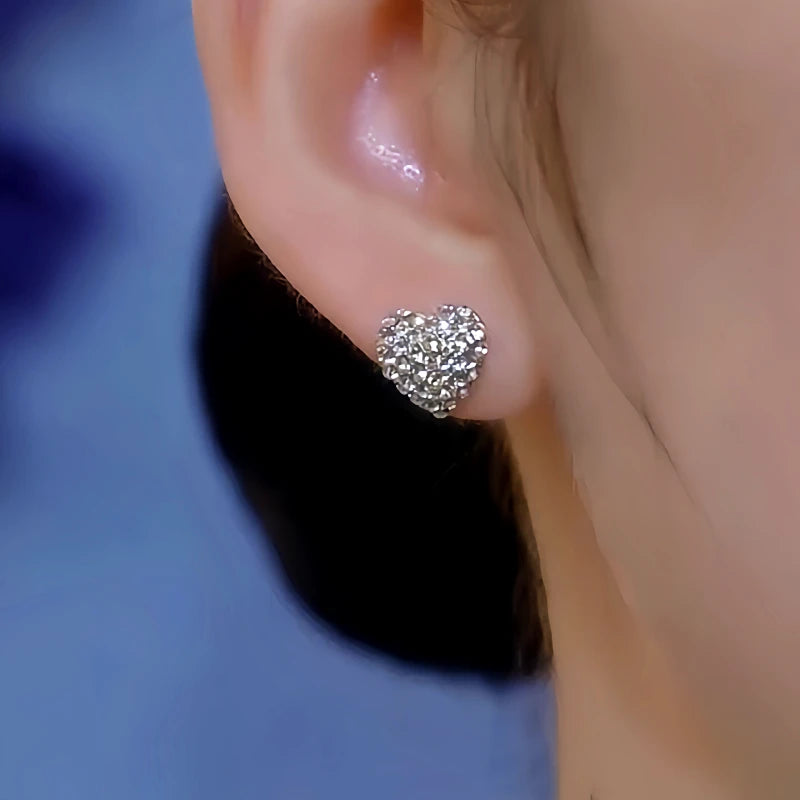 Close-up detail of the sparkling zircons and plating on the Heart Pearl Earrings