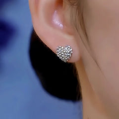 Close-up detail of the sparkling zircons and plating on the Heart Pearl Earrings