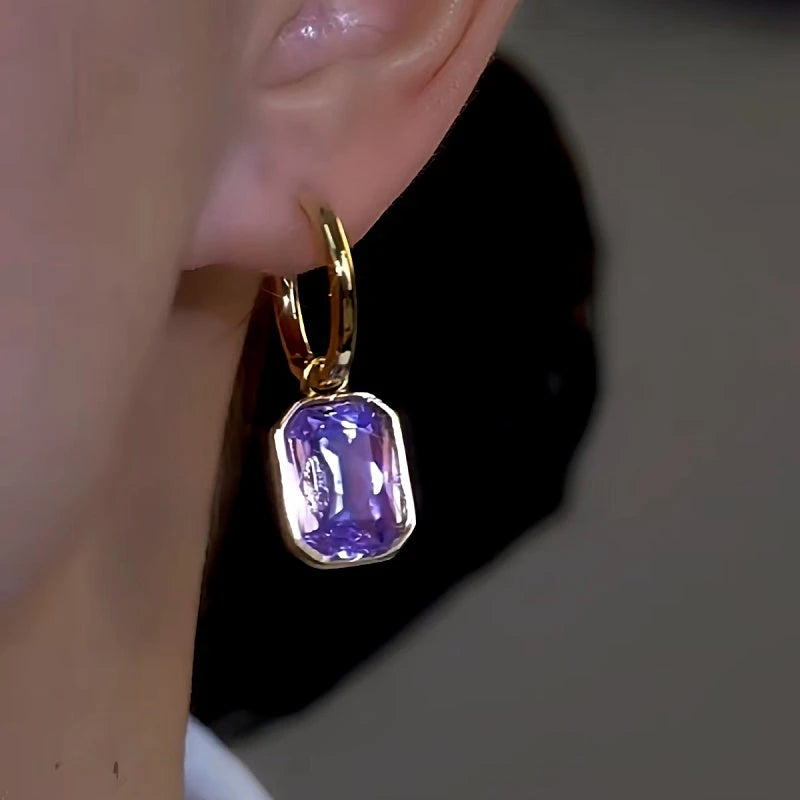 Close-up detail of the sparkling zircons and plating on the Asymmetrical Purple Zircon