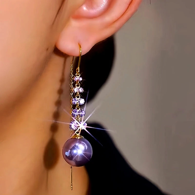 Close-up detail of the sparkling zircons and plating on the Pearl Threader Tassel