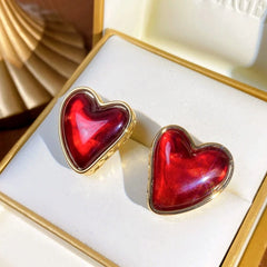 Close-up detail of the sparkling zircons and plating on the Red Heart Studs
