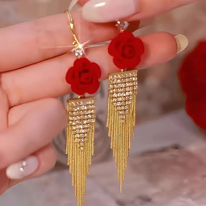 Close-up detail of the sparkling zircons and plating on the Red Rose Earrings