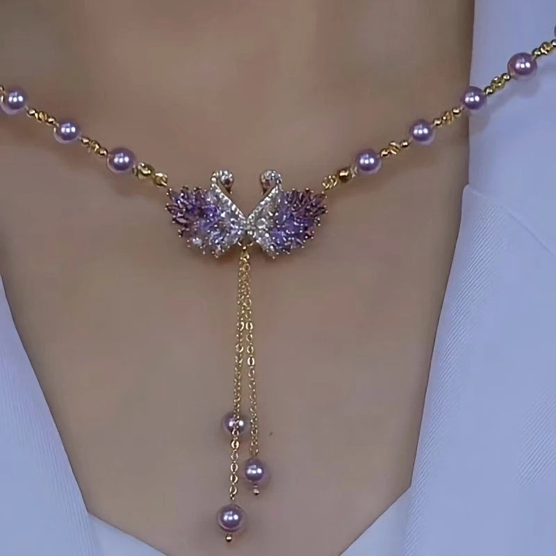 14K Gold-Plated Luxury Swan Pearl Necklace worn to showcase its length and pendant detail