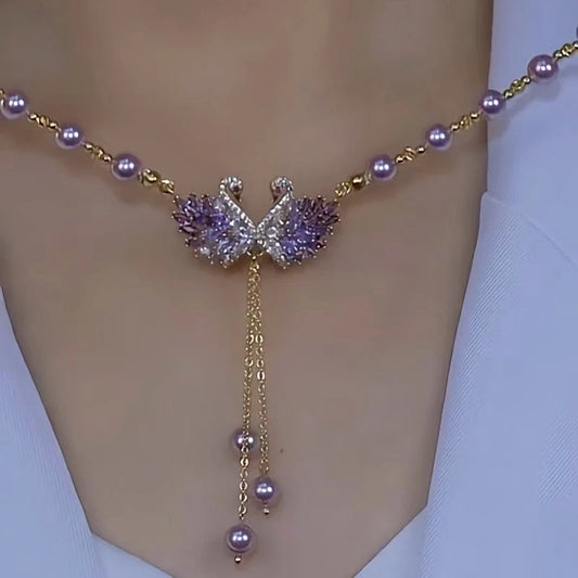 14K Gold-Plated Luxury Swan Pearl Necklace worn to showcase its length and pendant detail