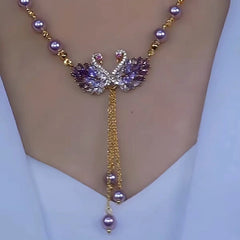 Detailed view of the 14K Gold-Plated Luxury Swan Pearl Necklace chain and pendant