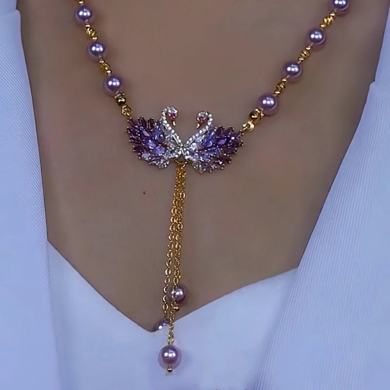 Close-up of the pendant and clasp on the Swan Pearl Necklace