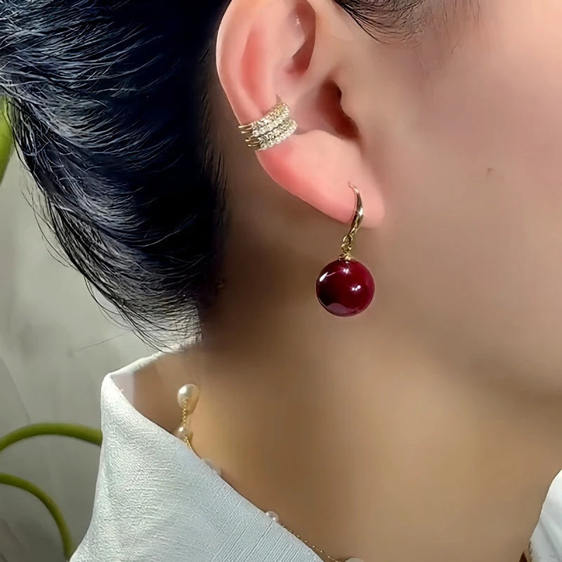 Close-up detail of the sparkling zircons and plating on the Red Pearl Threaders