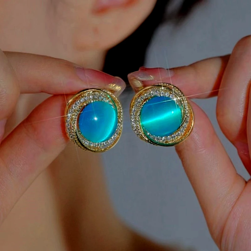 Styling the Cat's Eye Stud Earrings for a chic and modern look