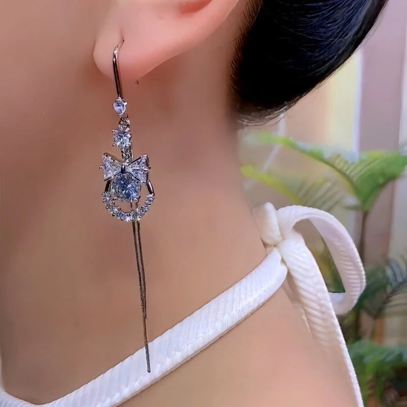 Close-up detail of the sparkling zircons and plating on the Diamond Bow Ear Hooks