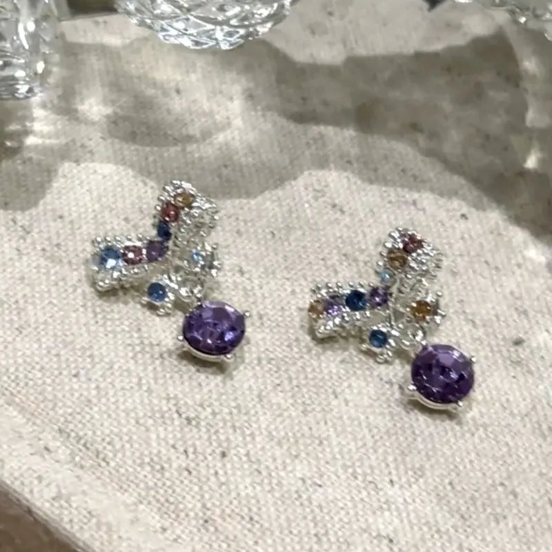 Close-up detail of the sparkling zircons and plating on the Diamond Butterfly Earrings