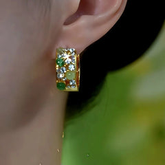 Close-up detail of the sparkling zircons and plating on the Cat's Eye Wide Hoops