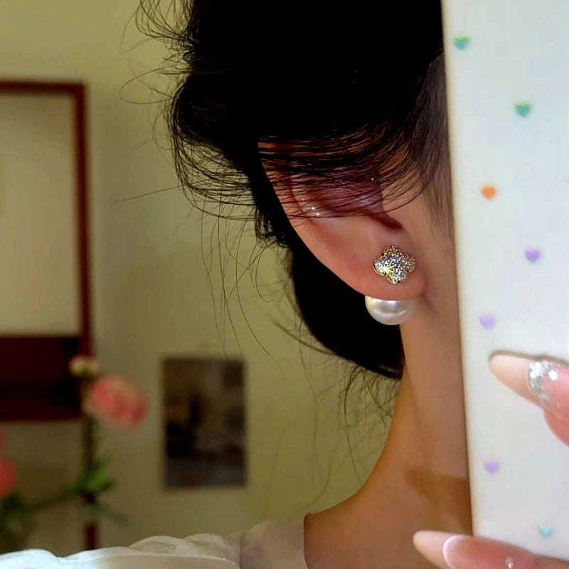 Close-up detail of the sparkling zircons and plating on the Flower Jacket Earrings