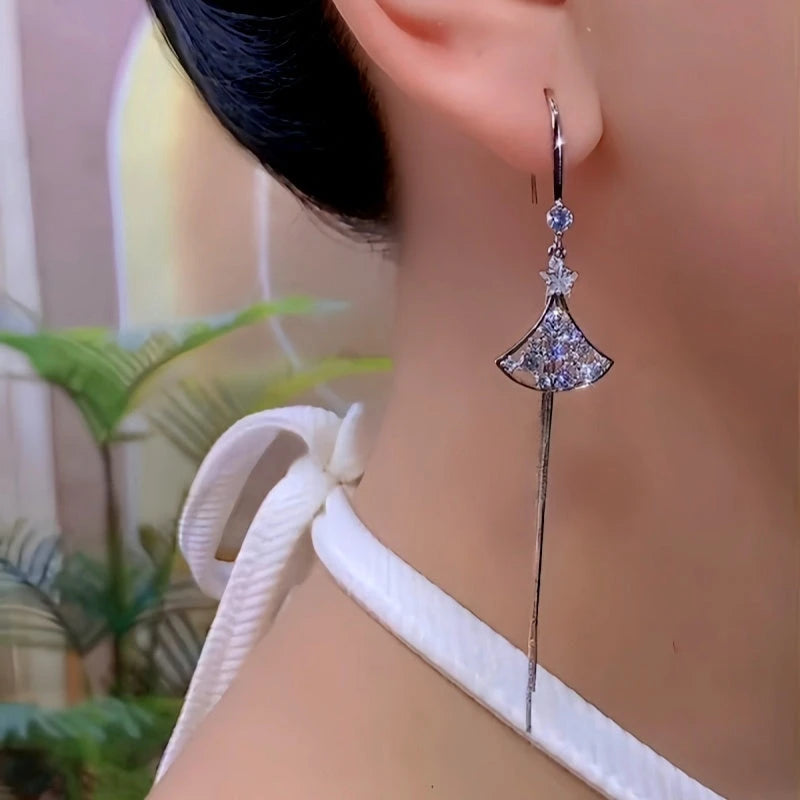 Model showcasing the dangle and style of the 14K Gold-Plated Luxury Zircon Diamond French Style Ear Hook Earrings