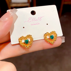 Close-up detail of the sparkling zircons and plating on the Hollow Heart Studs