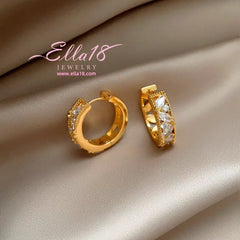 Model showcasing the dangle and style of the 14K Gold-Plated Luxury Zircon Diamond Hoop Earrings