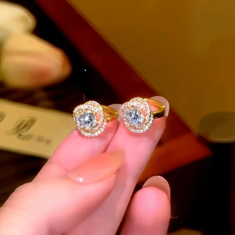 Model showcasing the dangle and style of the 14K Gold-Plated Luxury Zircon Diamond Little Hoop Earrings