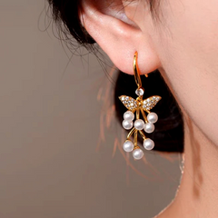 Close-up detail of the sparkling zircons and plating on the Pearl Tassel Ear Hooks