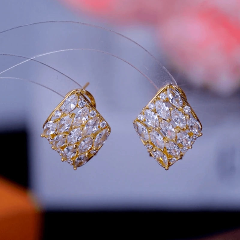Close-up detail of the sparkling zircons and plating on the Zircon Square Studs