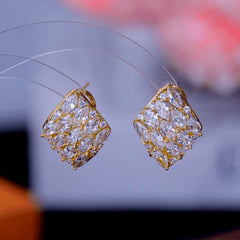 Close-up detail of the sparkling zircons and plating on the Zircon Square Studs