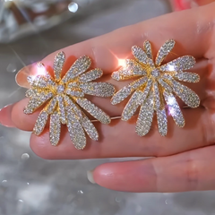 Close-up detail of the sparkling zircons and plating on the Zircon Firework Earrings