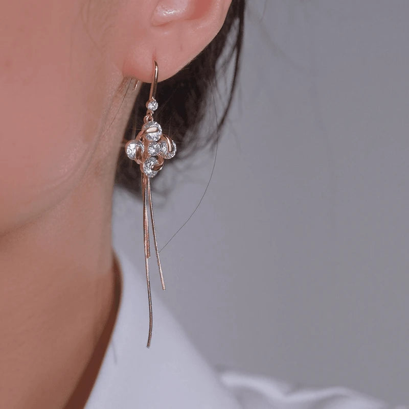 Close-up detail of the sparkling zircons and plating on the Flower Ear Hooks