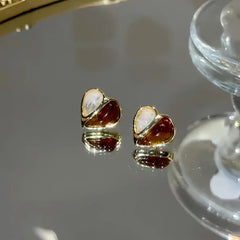 Close-up detail of the sparkling zircons and plating on the Pave Zircon Heart Studs