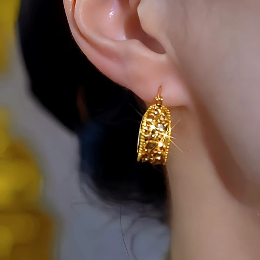Model showcasing the dangle and style of the 14K Gold-Plated Luxury Zircon Hoop Earrings