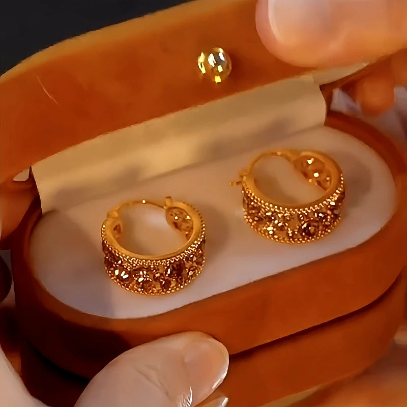 Angled view of the 14K Gold-Plated Luxury Zircon Hoop Earrings