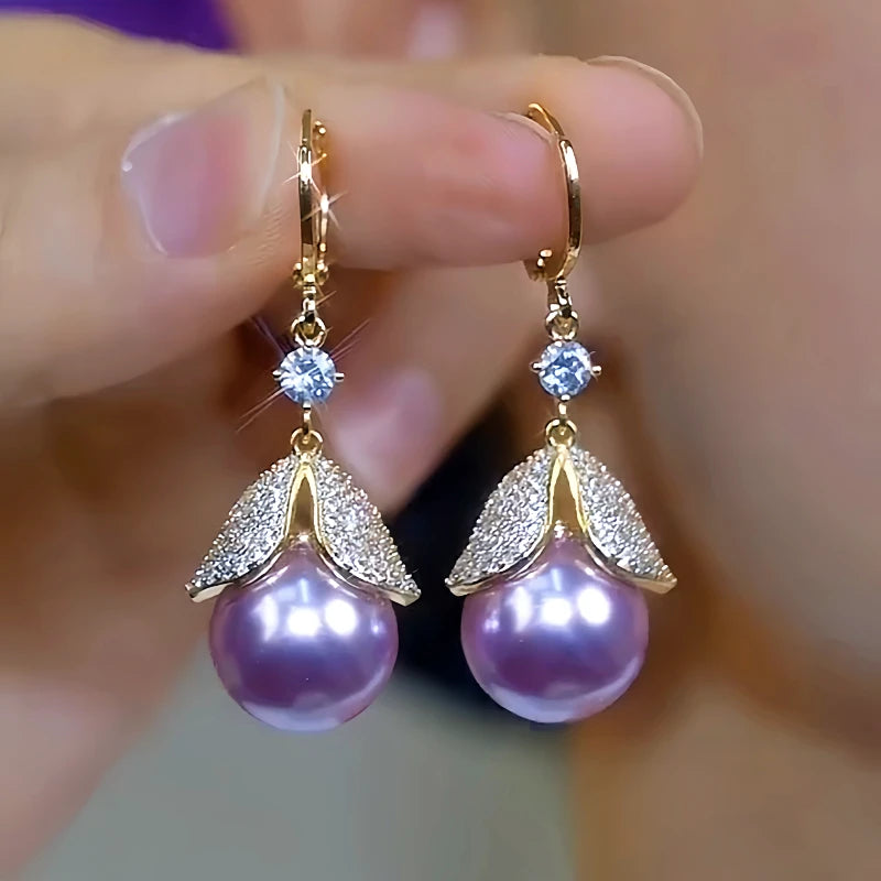 Close-up detail of the sparkling zircons and plating on the Leaf Pearl Earrings