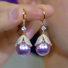 Close-up detail of the sparkling zircons and plating on the Leaf Pearl Earrings