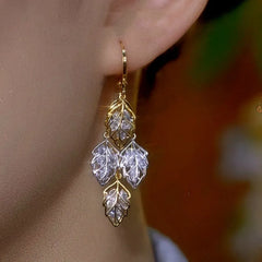 Close-up detail of the sparkling zircons and plating on the Zircon Leaf Tassel