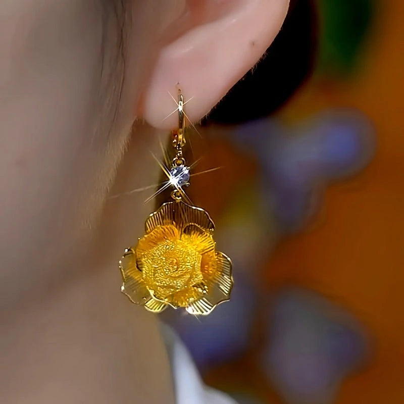 Close-up detail of the sparkling zircons and plating on the Rose Tassel Earrings