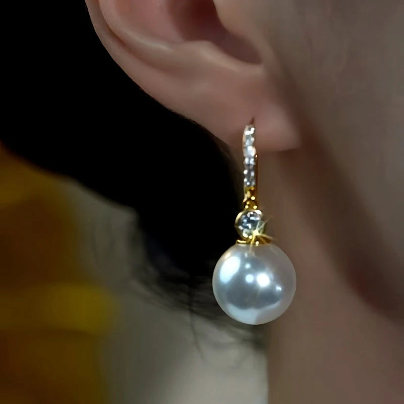 Close-up detail of the sparkling zircons and plating on the Zircon Pearl Earrings