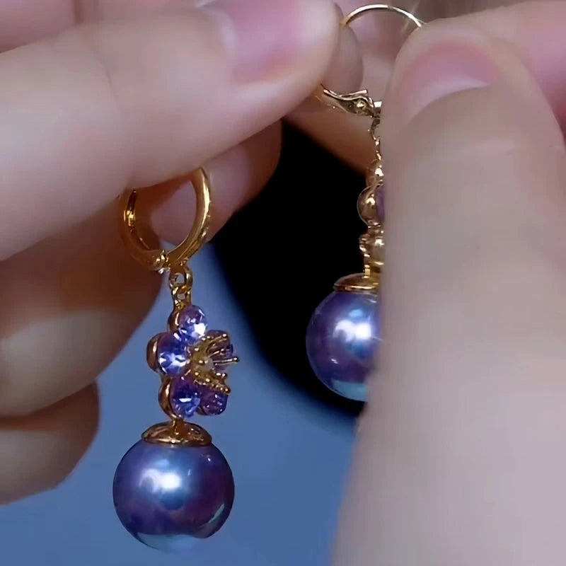 Close-up detail of the sparkling zircons and plating on the Purple Pearl Earrings
