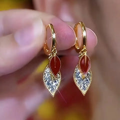 Close-up detail of the sparkling zircons and plating on the Zircon Red Leaf