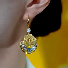 Close-up detail of the sparkling zircons and plating on the Zircon Rose Earrings