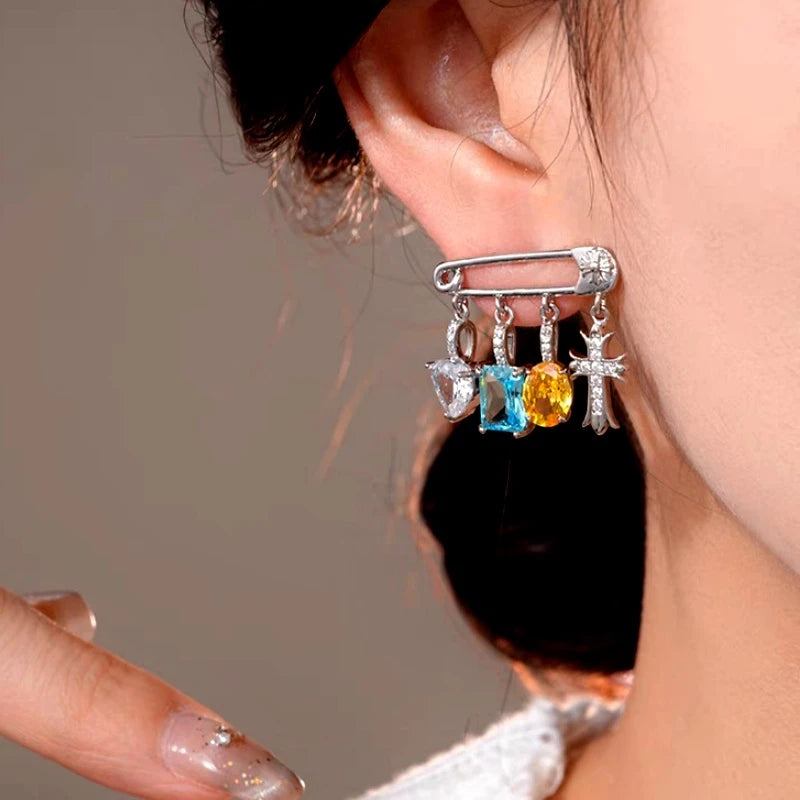 Model showcasing the dangle and style of the 14K Gold-Plated Luxury Zircon Tassel Earrings