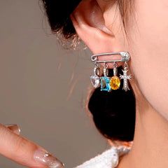 Model showcasing the dangle and style of the 14K Gold-Plated Luxury Zircon Tassel Earrings