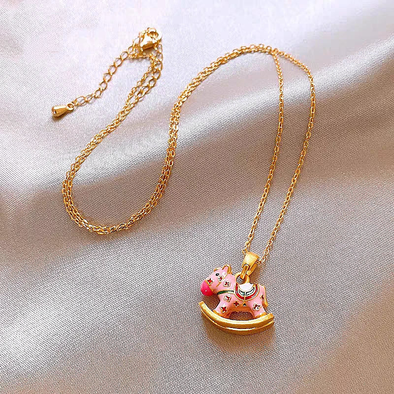 Detailed view of the 14K Gold-Plated Macaron-Colored Rocking Horse Necklaces chain and pendant