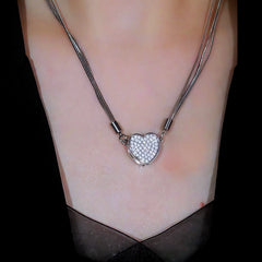 Close-up of the pendant and clasp on the Magnetic Heart Necklaces